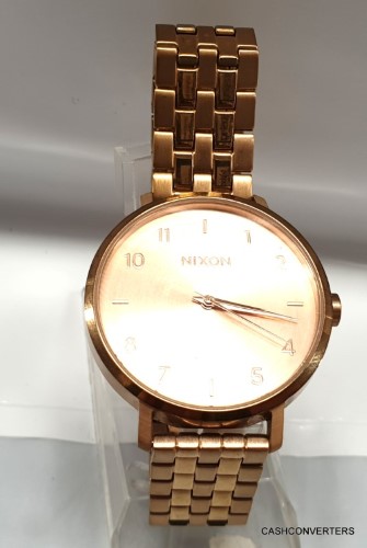 Nixon arrow rose on sale gold