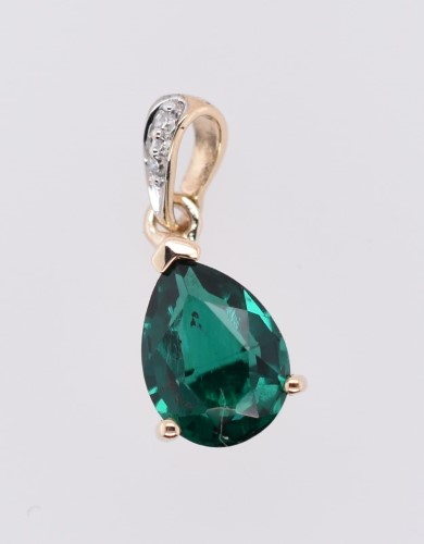 Green stone deals gold pendant